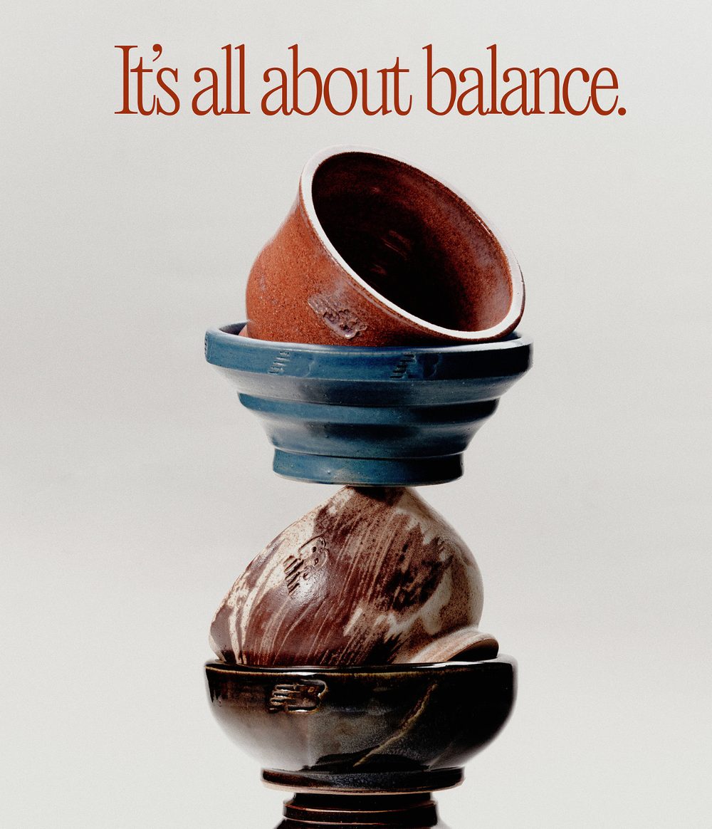 Stacked ceramic vessels balancing on one another